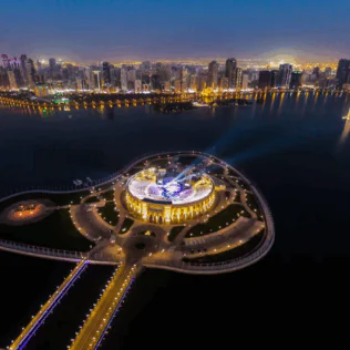 An Aerial Shot of Al Majaz Island at Night