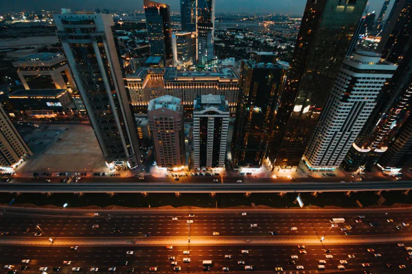 Aerial View of City Buildings During Night Time