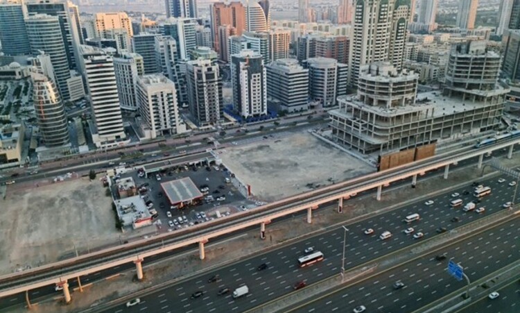Dubai road and many tall buildings