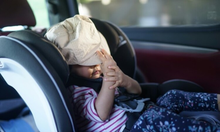 A child in an infant seat