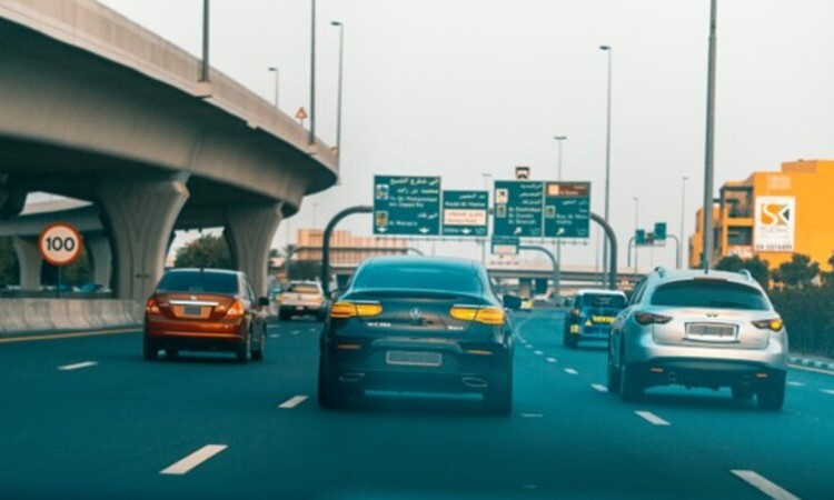 cars on Dubai road during daytime
