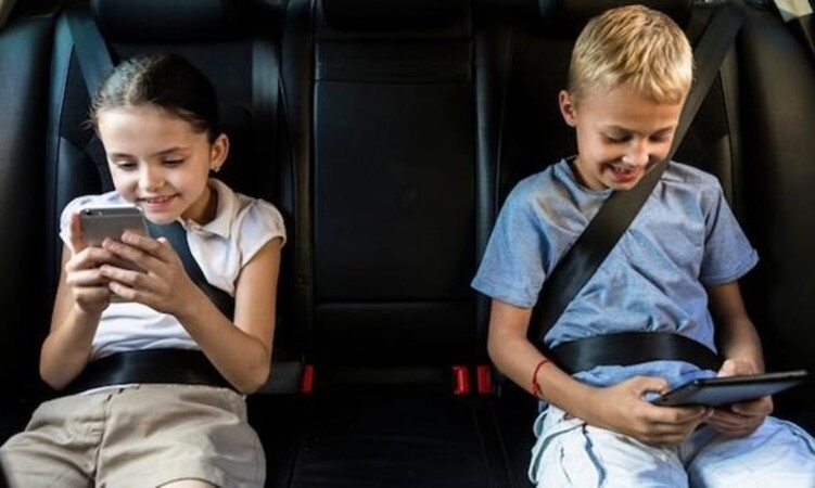 Little children sitting on the child car seat