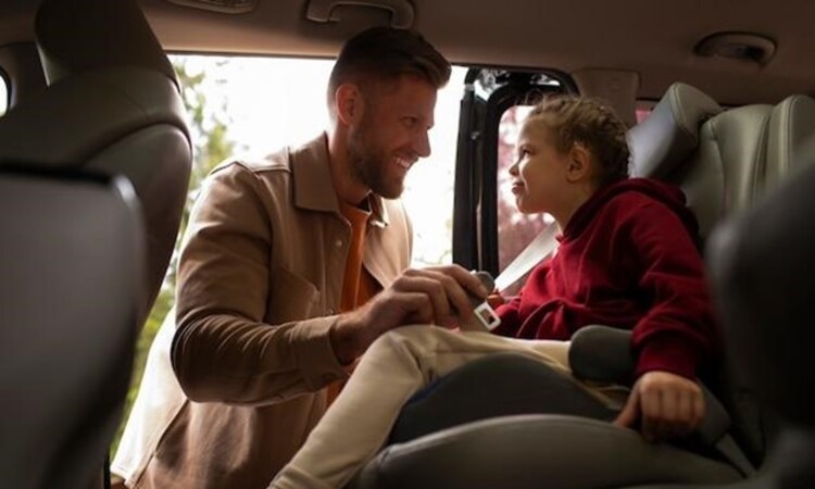 Girl with her dad enjoying family trip.