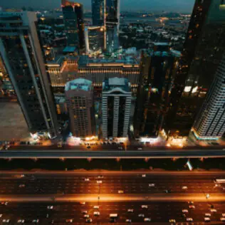 Aerial View of City Buildings in Dubai During Night Time