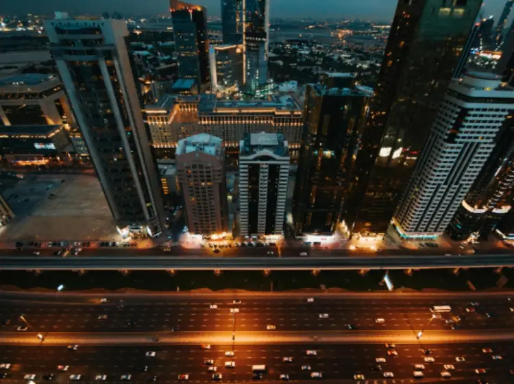 Aerial View of City Buildings in Dubai During Night Time