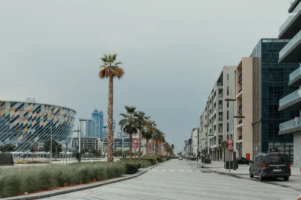 Modern residential buildings along a quiet street in Dubai City Walk area
