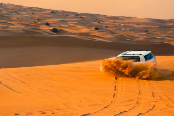 White Suv on Dessert in UAE