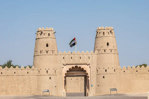 Historic Al Jahili Fort with UAE Flag